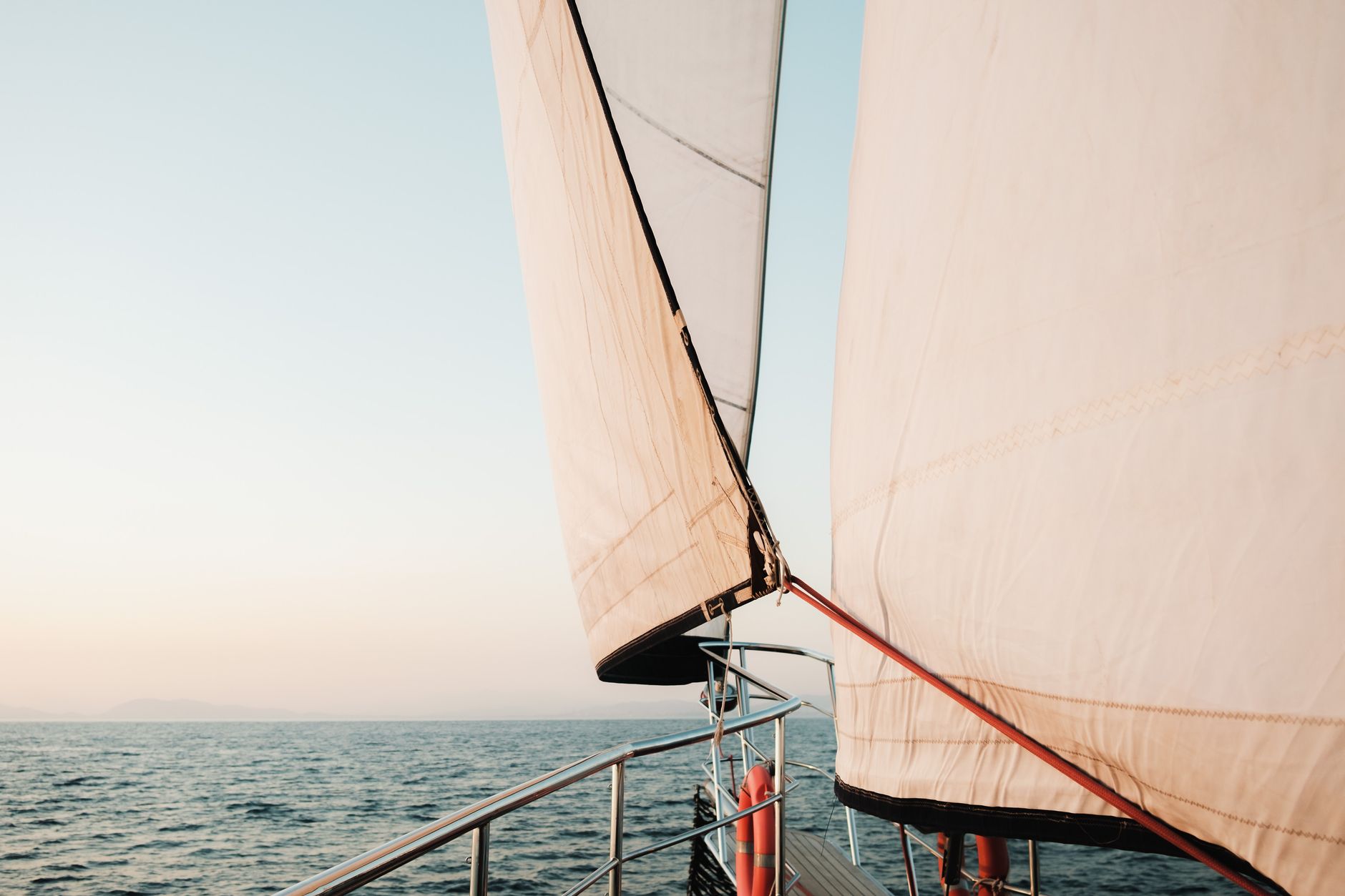 Historic coastal vessel on turquoise sea